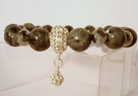 Armbnd i Gr Toner