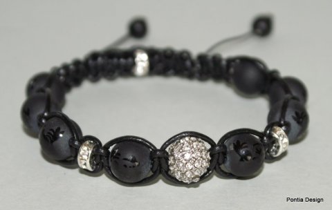 Onyx med kinesiske lykketegn