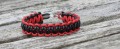 Armbnd tykt vendbart, rdt/sort