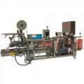 Upmatic 2002 - Fully automatic filling and sealing machine for polyethylene bags ranging from 0,5 kgs to 5 kgs filled weight.