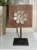 Carvet flower panel on stand