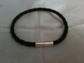 Snoet lderarmbnd