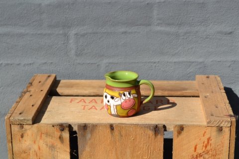 Milkjar with cow