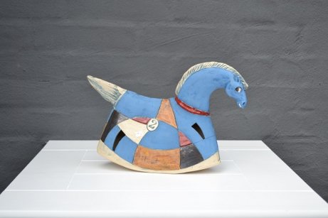 Blue/red and brown horse